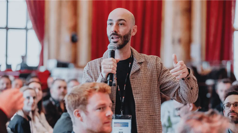 Renaud Bettin speaking at a conference